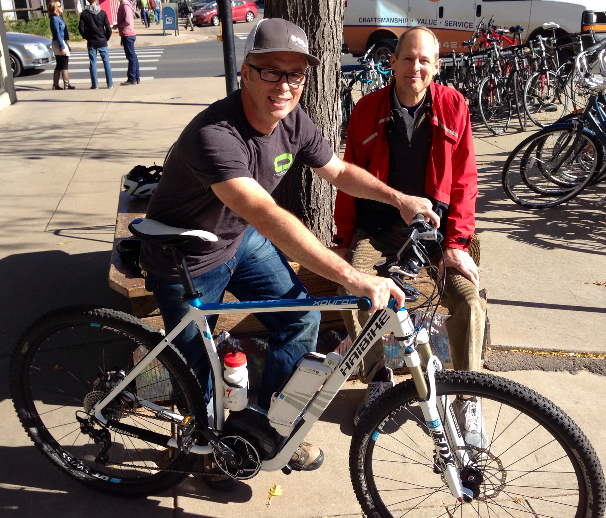 University Bikes GM Lester Binegar and Boulder Valley School District Bicycle Coordinator Landon Hilliard give it a spin.