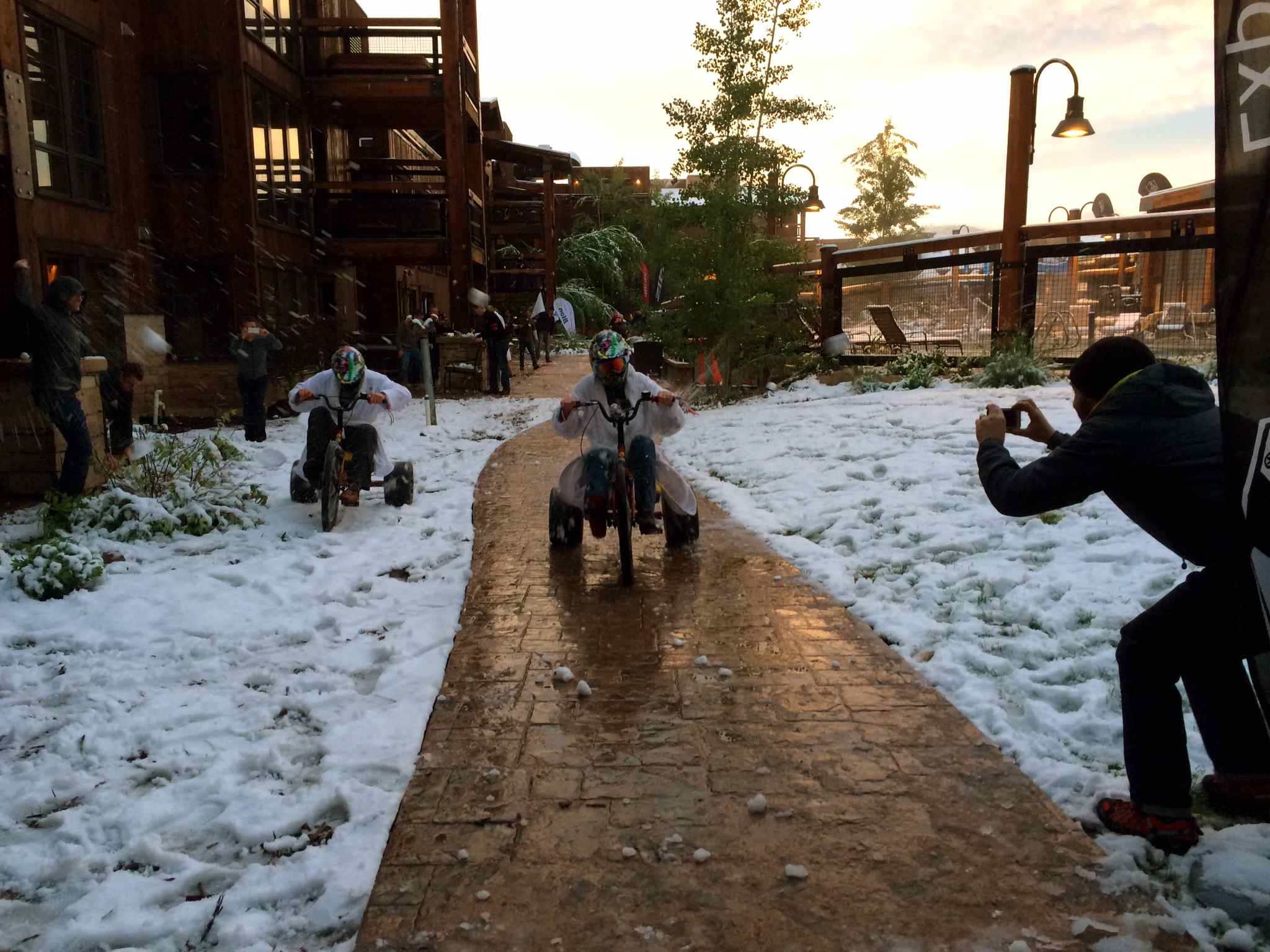 The flip cup finalists duke it out on big wheels while getting pelted by snowballs. Protective gear provided by Kali.