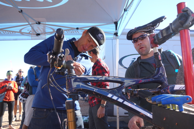 Ibis founder Scot Nicol, left, sets up a bike for Seattle's Todd Denkinger.