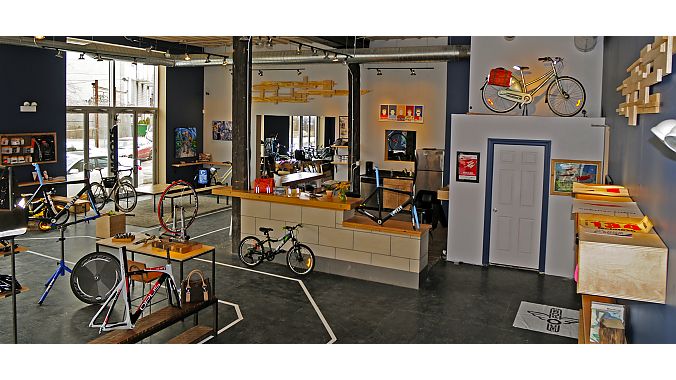 behind bars bicycle shop