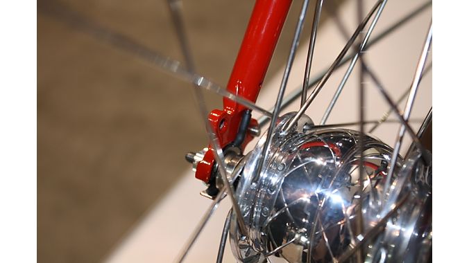 Harvey Cycles created internal wiring for a front generator hub, with the custom dropouts acting as the electrical connections. Harvey Cycles created internal wiring for a front generator hub, with the custom dropouts acting as the electrical connections.