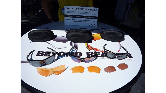 Not the three-cup game. Oakley challenged OutDoor Demo attendees to swap lenses as fast as possible. Steve Brasard of Quebec won a $600 Oakley Holeshot watch for his lens speed. Photo: Jill Janov
