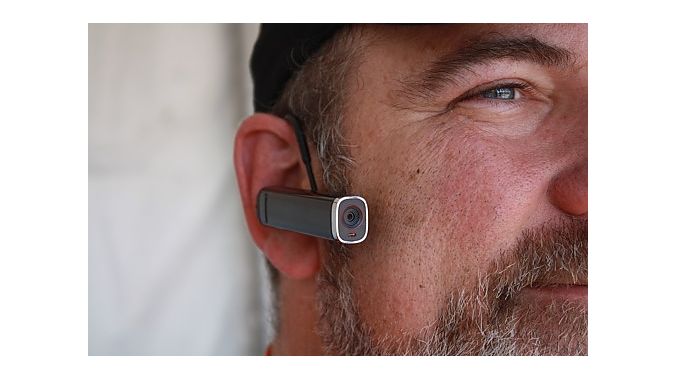 Jay Moore demonstrates the Looxcie, a tiny camera that can stream live video to your Facebook page. The camera sells for $149 to $179, depending on model, and weighs less than 30 grams. It can mount to a helmet, your ear or a hat brim. Jay Moore demonstrates the Looxcie, a tiny camera that can stream live video to your Facebook page. The camera sells for $149 to $179, depending on model, and weighs less than 30 grams. It can mount to a helmet, your ear or a hat brim.
