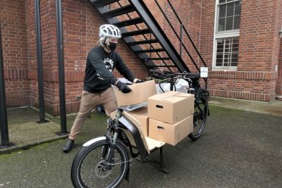 Kirill Glushko loads up. Photo: Paul Tolme/Cascade Bicycle Club.