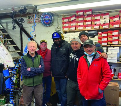 The current crew. From left: Thomas Bennett; Timmy, a customer; Anthony Newell; Vinnie Crispino; and George Bennett.