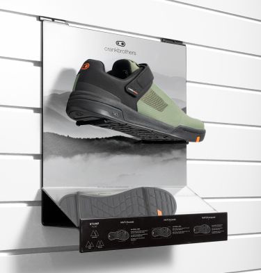 Crankbrothers' slat wall display has a mirror to emphasize the shoes' sole features.