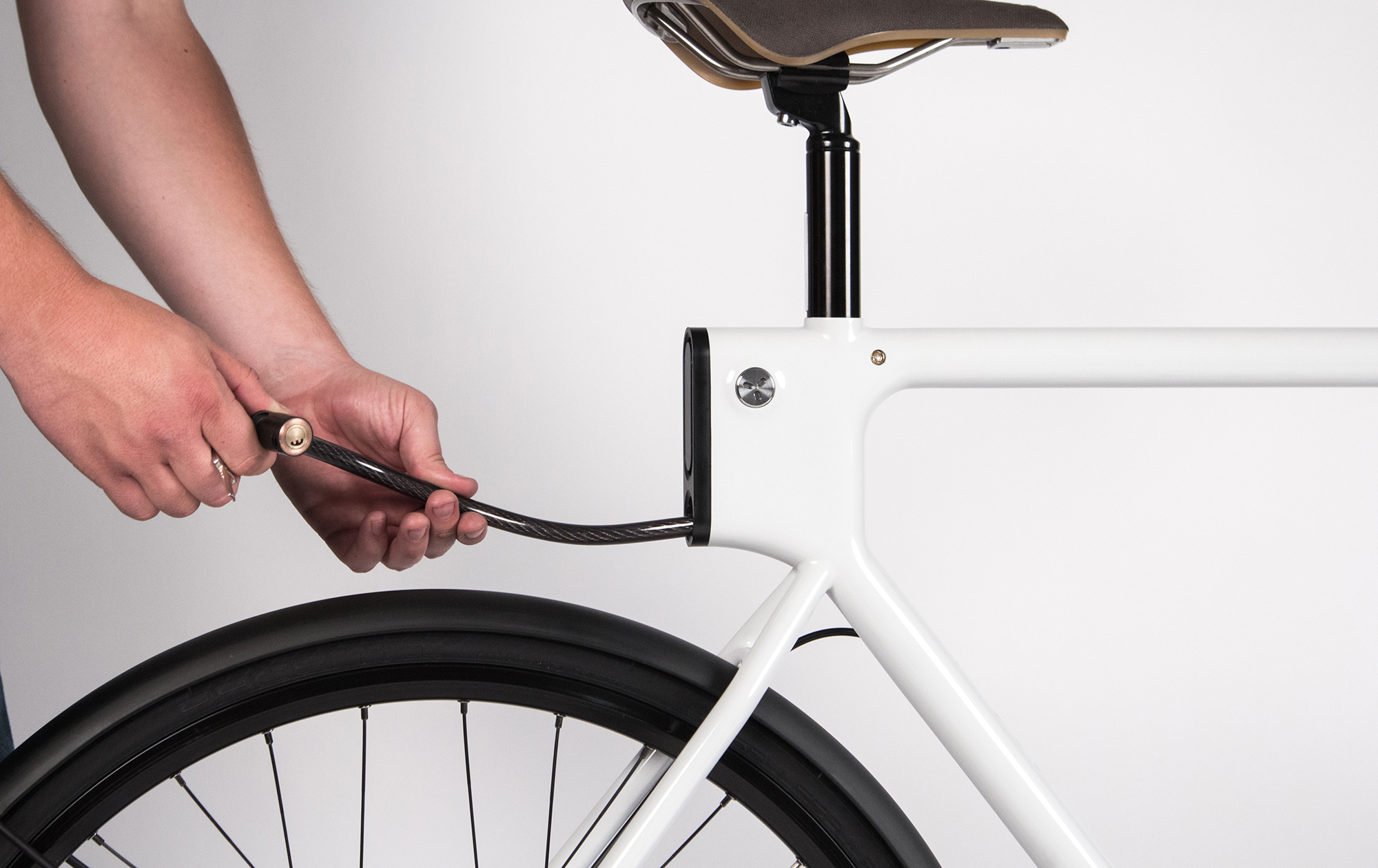 Retractable cable bike lock outlet