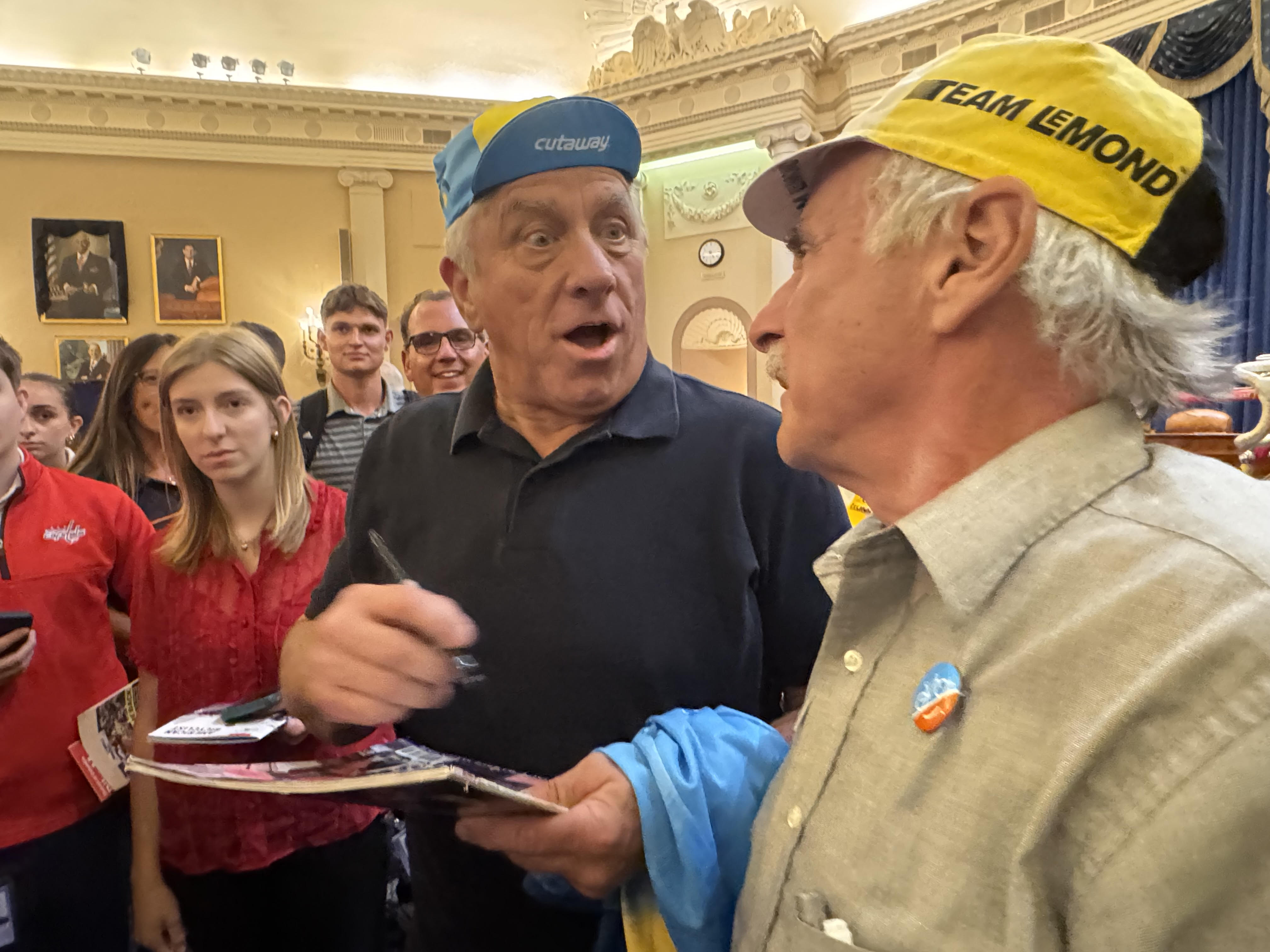 Greg LeMond and retailer Larry Black at the July 8 expo in Washington. Photo by Rostin Rostai