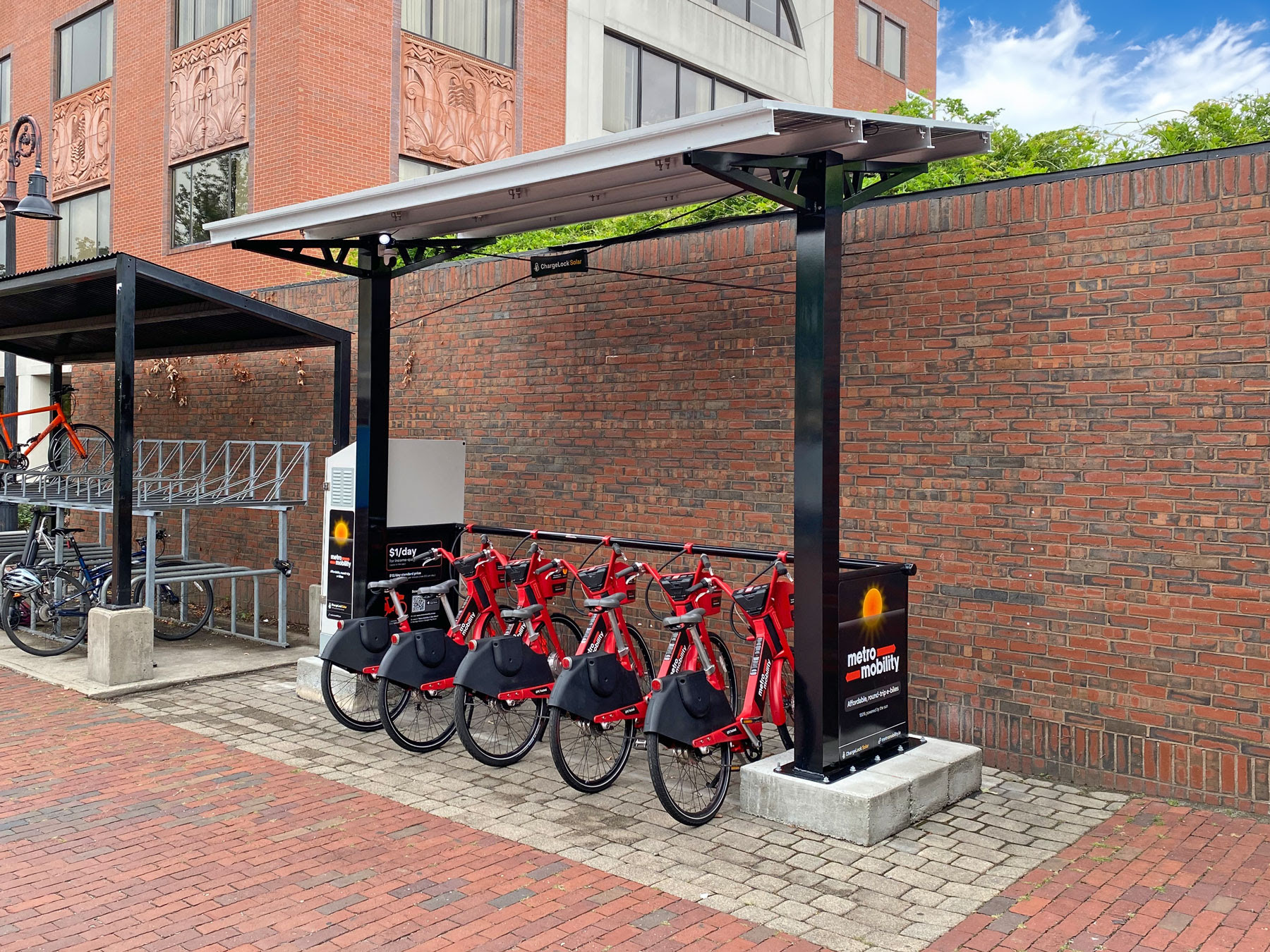 electric charging bicycle isinwheel M60 Bike for Adults 750W 28mph Ebike with 48V 13Ah Removable Battery, USB Port, 7 Speed Gearshift, 26"4" Fat Tire Electric Bicycles, Step Thru Cruiser E Bike bikes or scooters and makes a great addition to any indoor bike room Massachusetts opens its first solar-powered