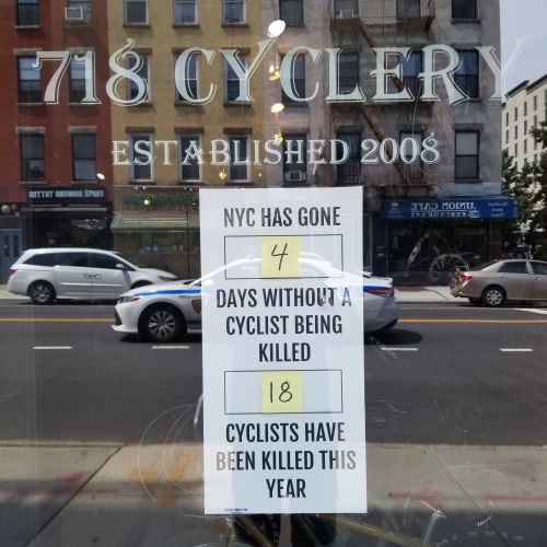 718 Cyclery owner Joe Nocella has a new sign in his window.