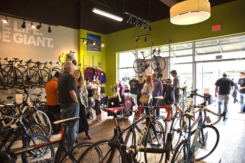 Customers mingle at the grand opening party at Cadence Cyclery's new store.