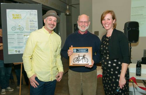 Fred Boykin (center) was recognized for his commitment to bicycle advocacy.