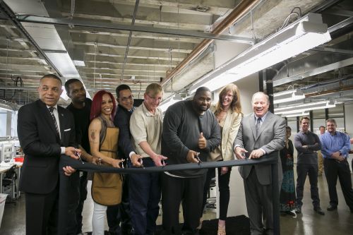 Ribbon cutting at the Shinola leather factory.