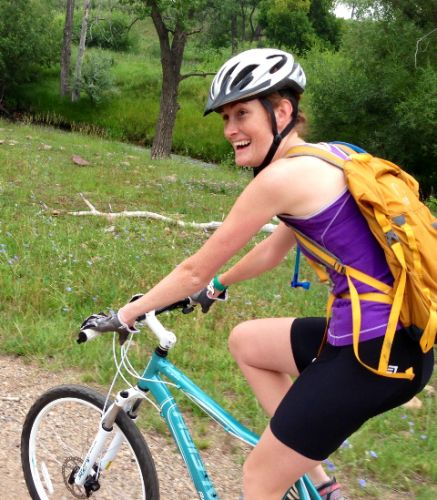 Daughter Kate, knuckles on bars, looking forward to her 125-degree stem