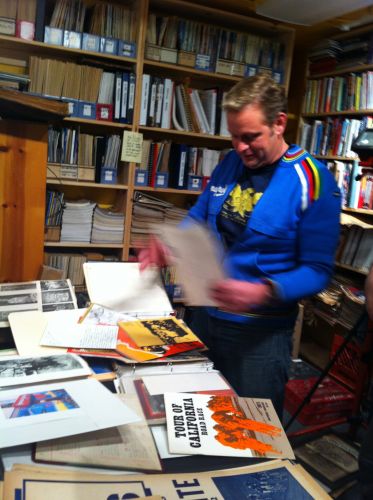 American Cyclery's Bradley Woehl in the historic store's archives.