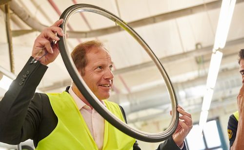 Tour director Christian Prudhomme tours a Conti' factory.