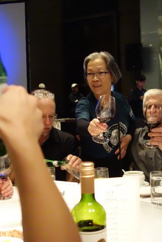 Stella Yu toasts guests at the 2019 Velo/Wellgo/Prologo dinner.