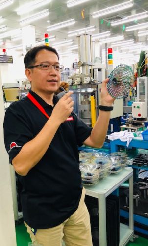Sram Asia GM/engineering manager Bob Chen shows off a mountain bike cassette.