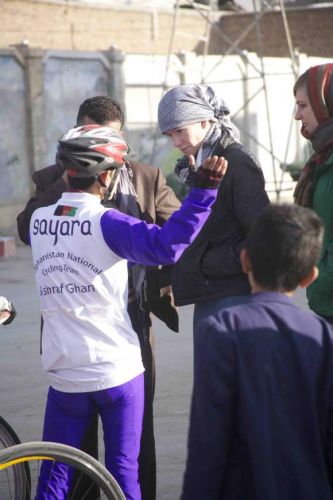 Galpin talks to a member of the Afghan national cycling team in Kabul. Photo: tony Di Zinno 