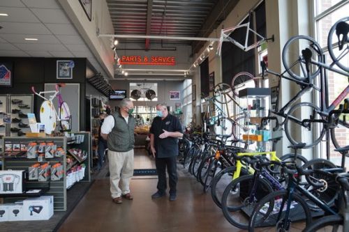 DOI Secretary David L. Bernhardt visits Big Ring Cycles in Denver on Friday (Photo by Tami Heilemann).