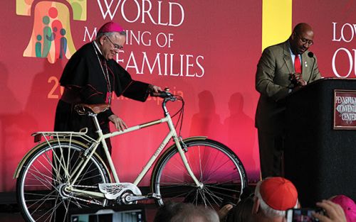 The Archbishop received the bike on behalf of Pope Francis.