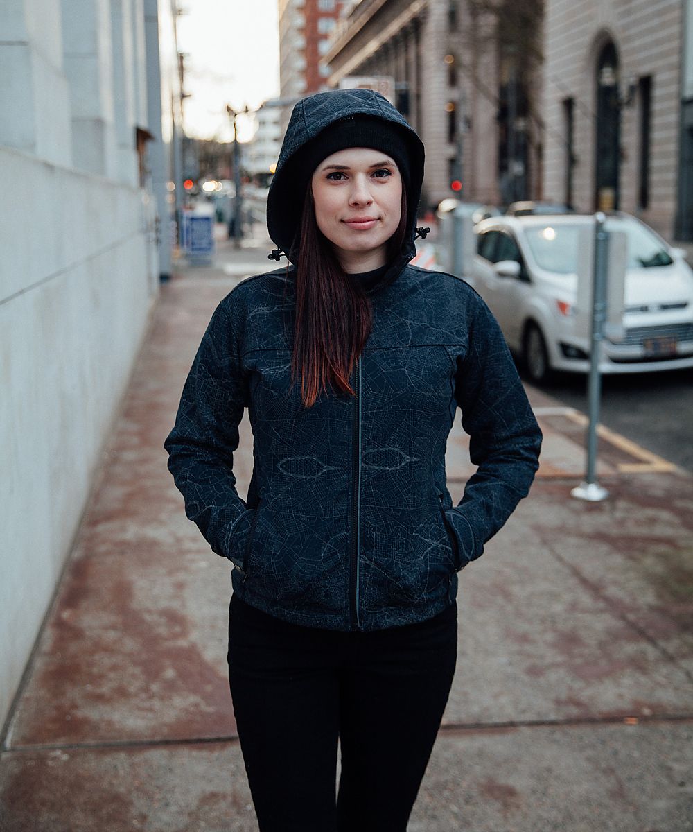 Showers Pass Odyssey Jacket features reflective map fabric
