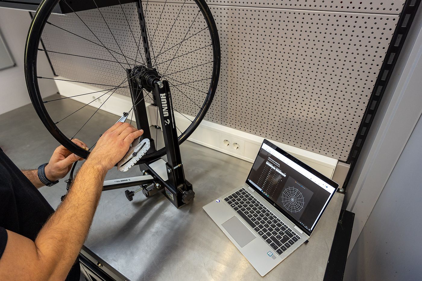 Bike spoke tension hot sale