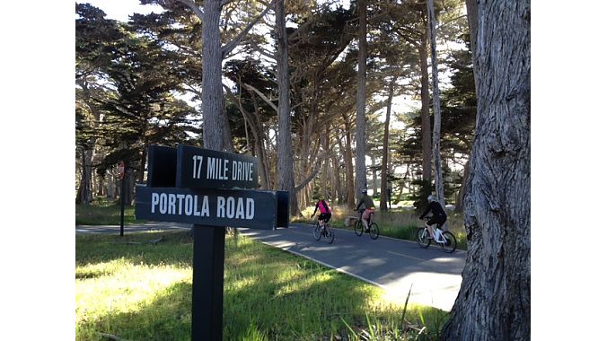 Cyclists cruise down the Monterey Coast’s scenic 17 Mile Drive on Wednesday during an industry ride for both the BLC and IBD Summit.