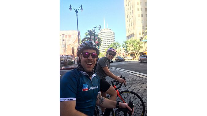 The ride down Hollywood Boulevard took PeopleForBikes’ Mitch Marrison and BRAIN features editor Val Vanderpool past the landmark Capitol Records building (background) in Hollywood.