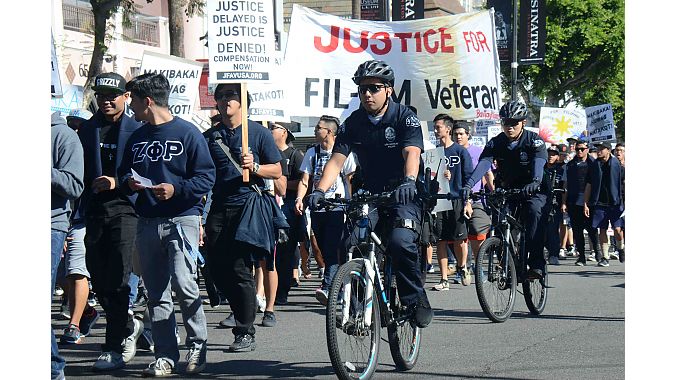 The ride through Hollywood was punctuated by a Veterans Day protest march held by Justice for Filipino American Veterans, which advocates for recognition and just compensation for Filipino World War II veterans and their families.