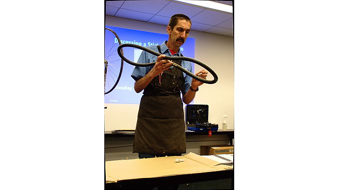 Jones demonstrates tire gluing.