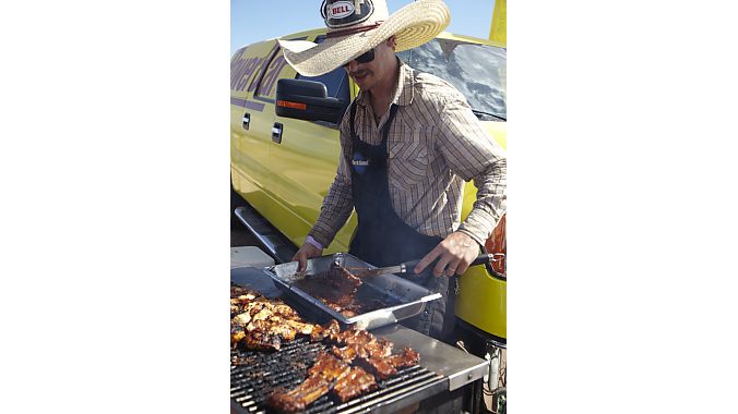 Bell's Allan Cooke, a vegan, cooks up some chicken and ribs for the demo.