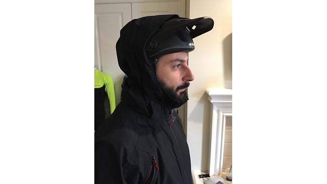 Alpinestars' Giulio Neri demonstrates the helmet compatibility of the Italian brand's All Mountain 2 WP Jacket.