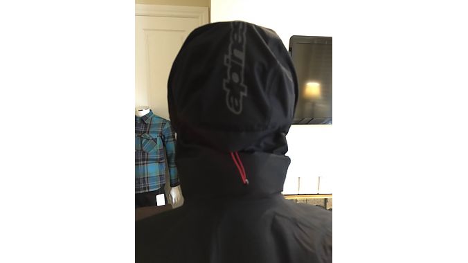 A draw cord fits the hood of the All Mountain 2 WP Jacket snugly over the rider's helmet.
