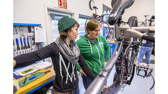 B Vivit (left), a QBP Women's Bike Mechanic Scholarship winner, attended UBI in early 2017.