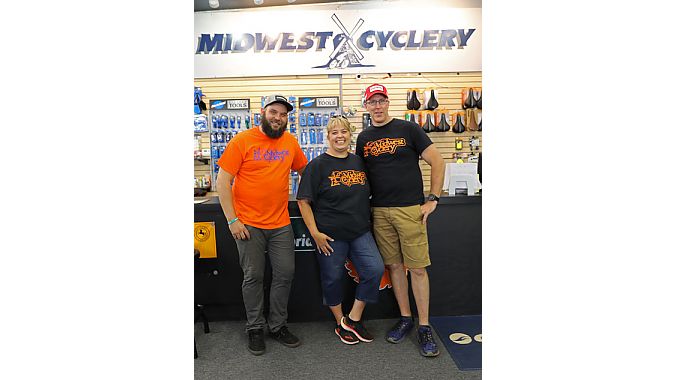 Christina Baanders Decker and Bob Decker, pictured here with mechanic Trent Alexander (left).