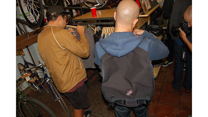 Two customers at Golden Saddle Cyclery check out the new line