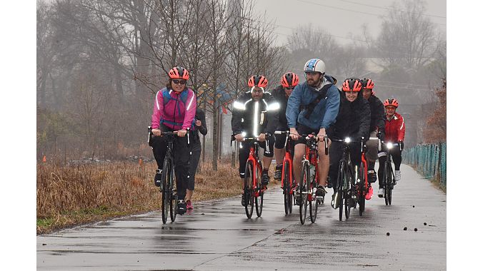 A wet but happy crew on the road.