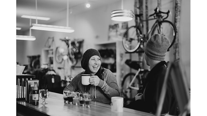 The shop's café serves locally roasted coffee, craft beer and food for breakfast, lunch and dinner. (Photo by Rivers and Roads Photography)