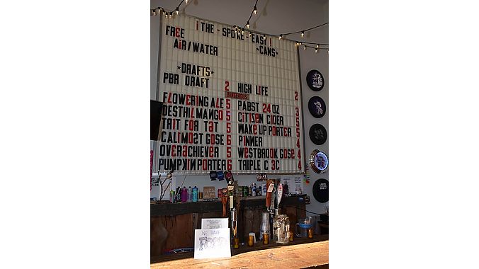 The bar in The Spoke Easy's retail space offers seven tap handles as well as a selection of canned beers and ciders.