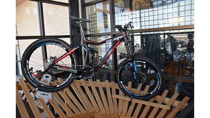 The cool wood feature display from the entry, or just the showroom of pure mountain bike awesomeness.