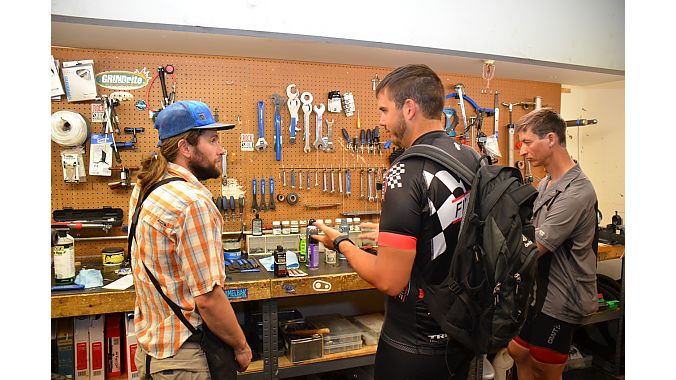 Goltz chats with the Sports Den's mechanic about new Finish Line products.