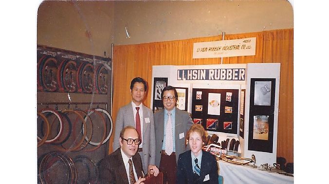 Bob Fluhr, bottom left, with son Steven at the 1980 New York bike show. The man standing on the left is Mark Tsai, the owner of Li Hsin Rubber and the other man is Joe Hwang, then the sales manager for LHR USA.