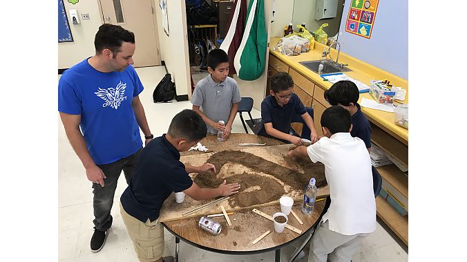 Students get their hands dirty in the USA BMX Foundation’s Track Modeling Program, which has helped draw new participants to the BMX Racing League. 