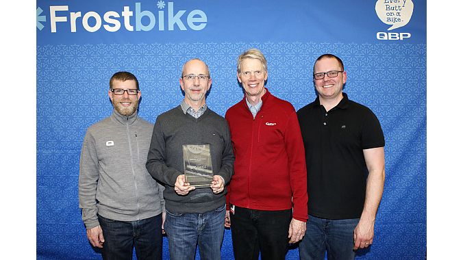 (l to r): QBP buyer Dave Larson, DT Swiss' Marco Zingg, QBP president Steve Flagg, and QBP's product director Tim Gallant.