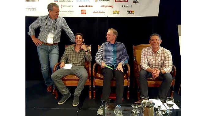 Moderator Pat Hus (left), and panelists (L-R) Michael Fishman of Pure Cycles, Erik Saltvold of Erik's Bike and Board, and Columbia Sportswear's Russ Hopcus, all showed up in plaid for Thursday's omnichannel panel discussion. Photo by Ray Keener. 