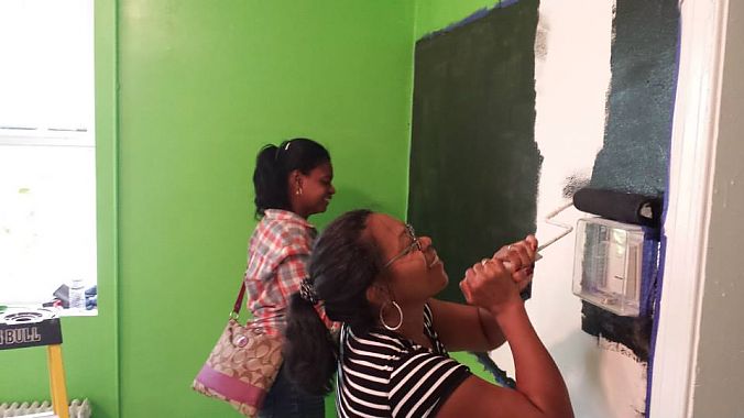 As a nonprofit, Gearin’ Up has a large army of volunteers to keep things running. Here, volunteers help paint the new space.