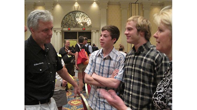 Bikes Belong's Tim Blumenthal chats with Lynn Guissinger and her two sons, Cooper and Griffin (at Interbike for the first time), after the industry breakfast. Her husband, Leslie Bohm, was remembered at the breakfast for his advocacy leadership with a standing ovation. Photo: Lynette Carpiet