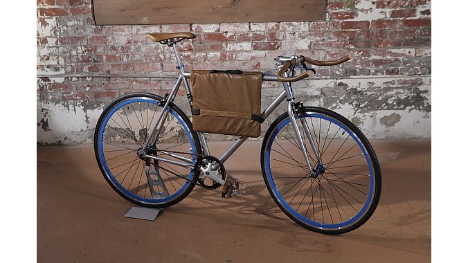 The 1854 Garrison model, shown with matching leather frame bag.