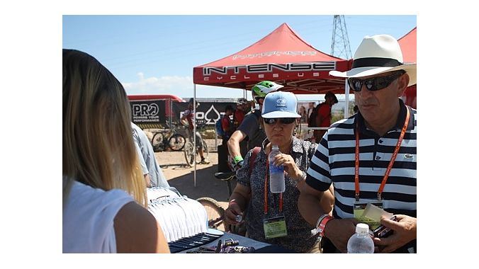 Elsa Nubia Jimenez and Jesus Vasquez of Bicletas Gall in Bogata, Colombia, check out Crank Bros pedals at the Demo Monday.